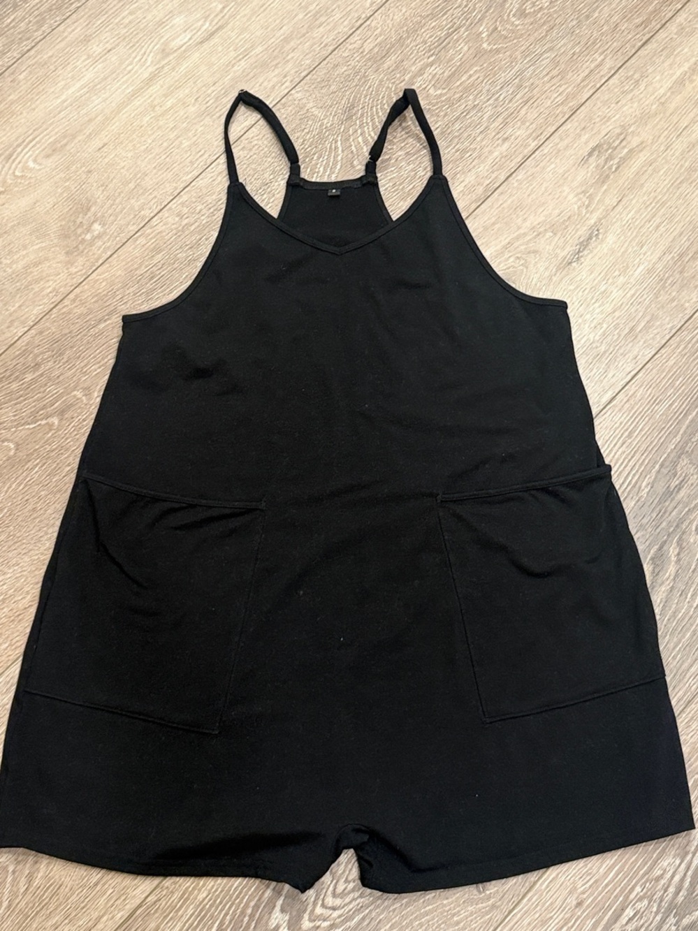 Vici Black Sleeveless Romper with Front Pockets